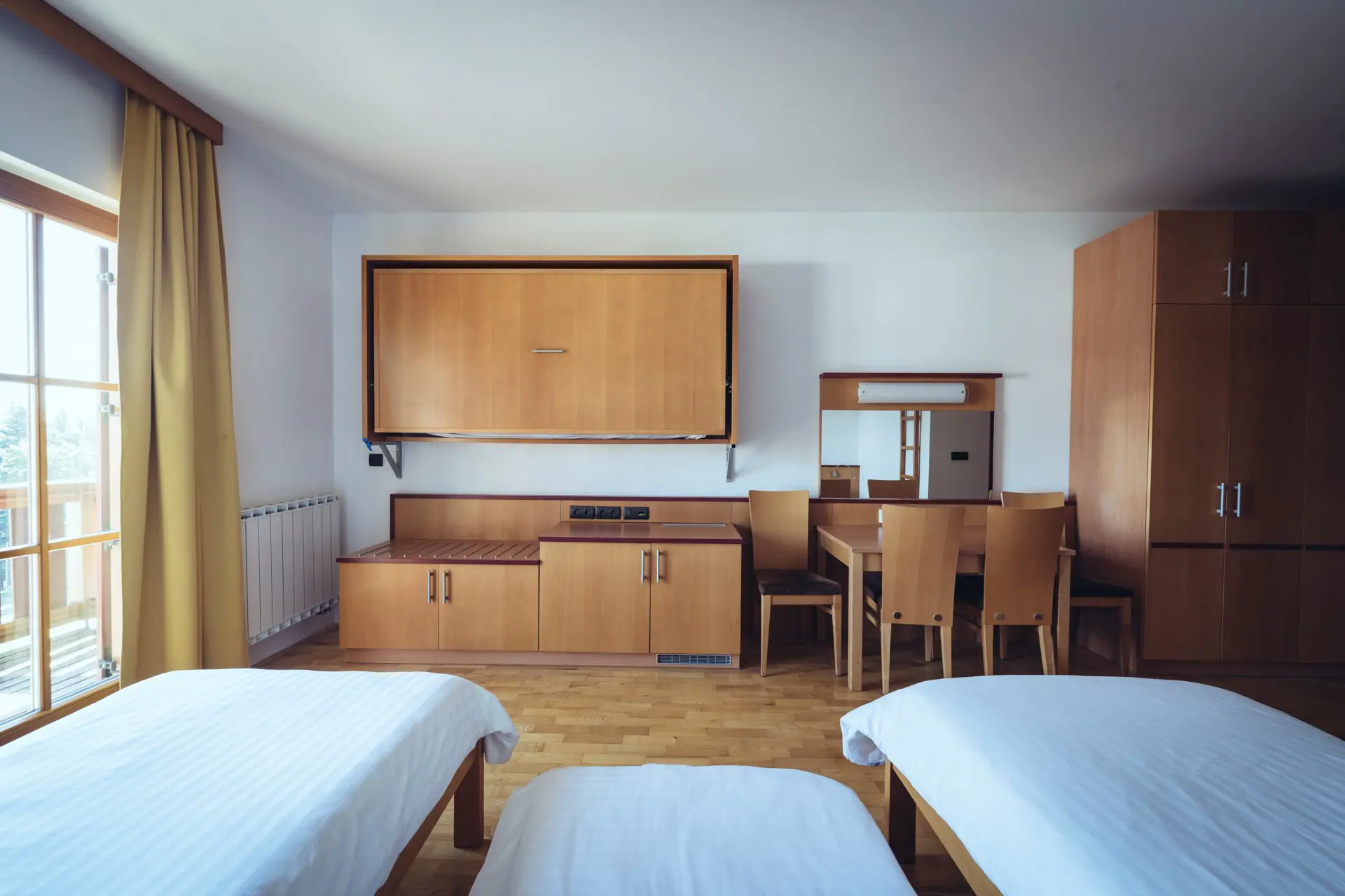Druzinske Sobe Miza Family Rooms Table Forest Hotel Videc Pohorjevillageresort Hocko Pohorje Slovenia
